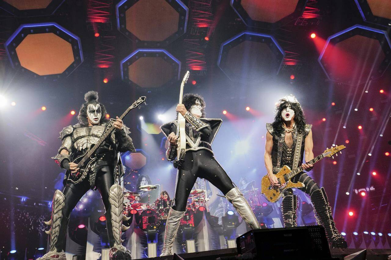 Gene Simmons, left, Tommy Thayer, and Paul Stanley of KISS perform during the final night of the "Kiss Farewell Tour" on Saturday, Dec. 2, 2023, at Madison Square Garden in New York. (Photo by Evan Agostini/Invision/AP)