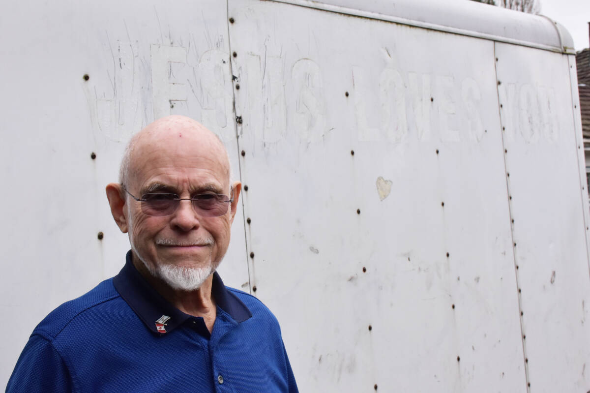Ed Roy is coordinator for a ministry that helps feed and cloth people on the streets. His church’s trailer was stolen, and the thieves tried to scratch the message off the side. (Neil Corbett/The News)