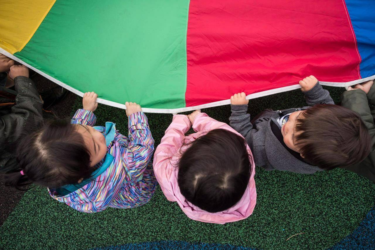A new report from Statistics Canada says child care was more affordable across the country in 2023, but more parents are having difficulty finding it. Children play at a daycare in Coquitlam, B.C., on Wednesday March 28, 2018. THE CANADIAN PRESS/Darryl Dyck