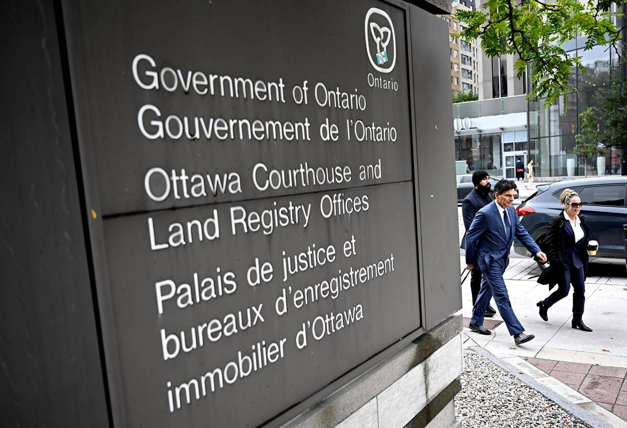 Tamara Lich and her lawyer Lawrence Greenspon arrive for her trial at the courthouse in Ottawa, on Tuesday, Sept. 19, 2023. The criminal trial of “Freedom Convoy” leaders Lich and Chris Barber has adjourned after more than 30 days of evidence and arguments, and is expected to resume early next year.THE CANADIAN PRESS/Justin Tang