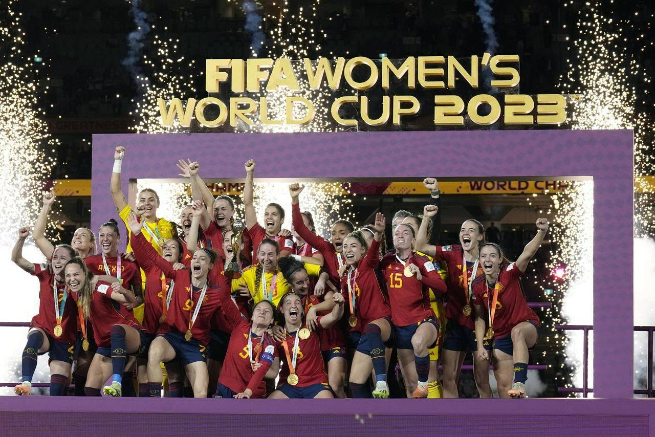 FIOLE - Spain players celebrates after winning the Women’s World Cup soccer final against England at Stadium Australia in Sydney, Australia, Sunday, Aug. 20, 2023. The U.S. Soccer Federation and Mexico Football Federation submitted a joint bid to host the 2027 Women’s World Cup, competing against an expected proposal from Brazil and a joint Germany-Netherlands-Belgium plan. (AP Photo/Alessandra Tarantino, File)