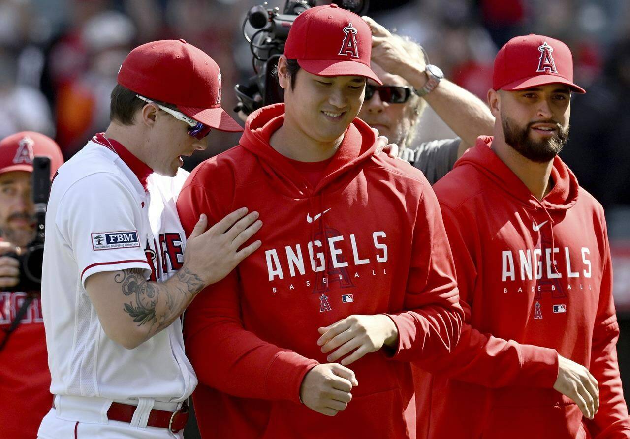Shohei Ohtani has opted to stay in southern California, and the Toronto Blue Jays have missed out on landing a generational talent. Los Angeles Angels’ Mickey Moniak, left, walks with Ohtani, center, after playing against the Oakland Athletics in a baseball game, in Anaheim, Calif., Sunday, Oct. 1, 2023. THE CANADIAN PRESS/AP-John McCoy