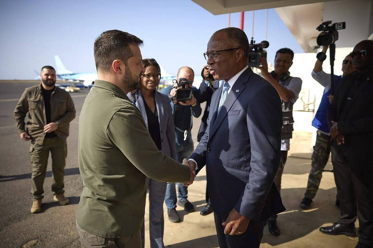 In this photo provided by the Ukrainian Presidential Press Office, Ukrainian President Volodymyr Zelenskyy, left, meets with Cape Verde’s Prime Minister Ulisses Correia e Silva, in Cape Verde, Saturday, Dec. 9, 2023 while he travels to Argentina for the inauguration of the newly-elected President Javier Milei. (Ukrainian Presidential Press Office via AP)