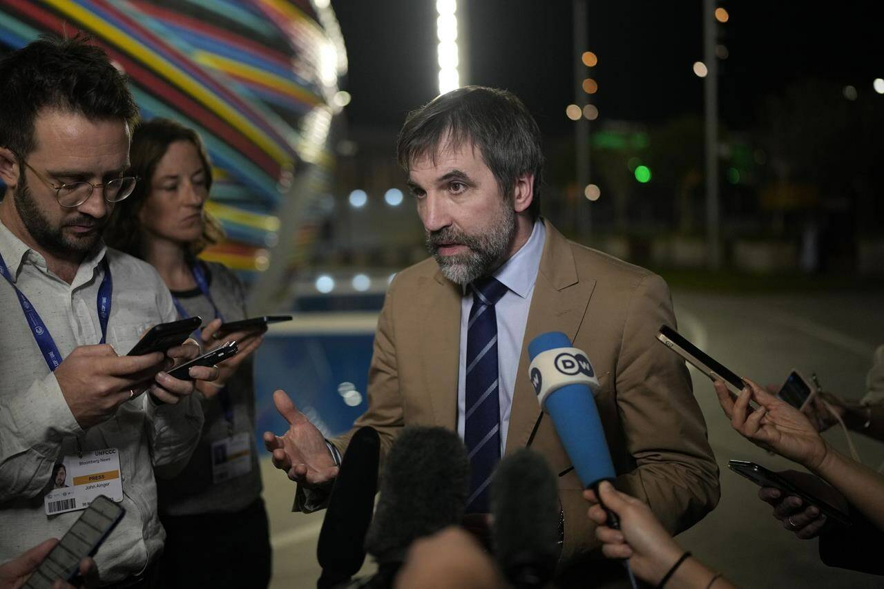 Steven Guilbeault, Canada environment and climate minister, speaks to members of the media at the COP28 U.N. Climate Summit, Tuesday, Dec. 12, 2023, in Dubai, United Arab Emirates. Guilbeault is hailing what he called the “monumental” outcome of the United Nations climate summit. THE CANADIAN PRESS/AP-Rafiq Maqbool