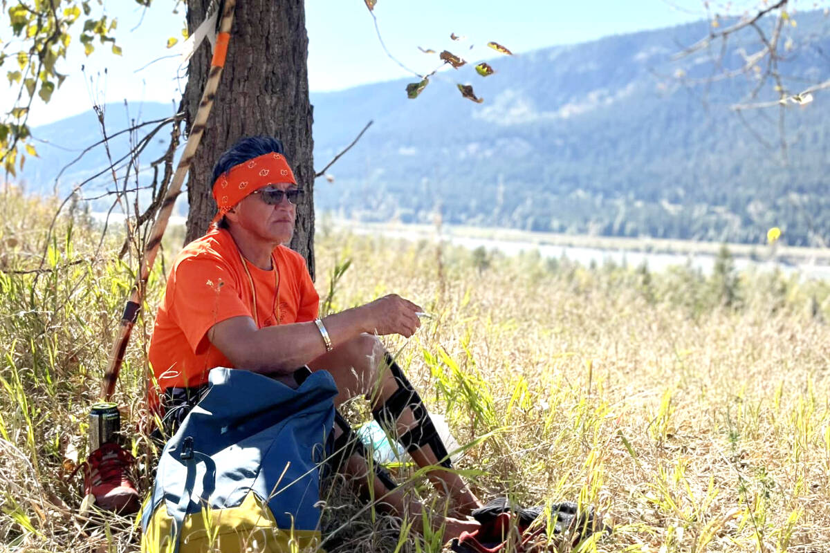 Archie Chantyman rests after his long march for truth and healing from his home Lhoosk’uz Dene Nation back to the site of St. Joseph’s Mission where he and many other Indigenous children were interned in residential school. (Araiah Fraser photo)