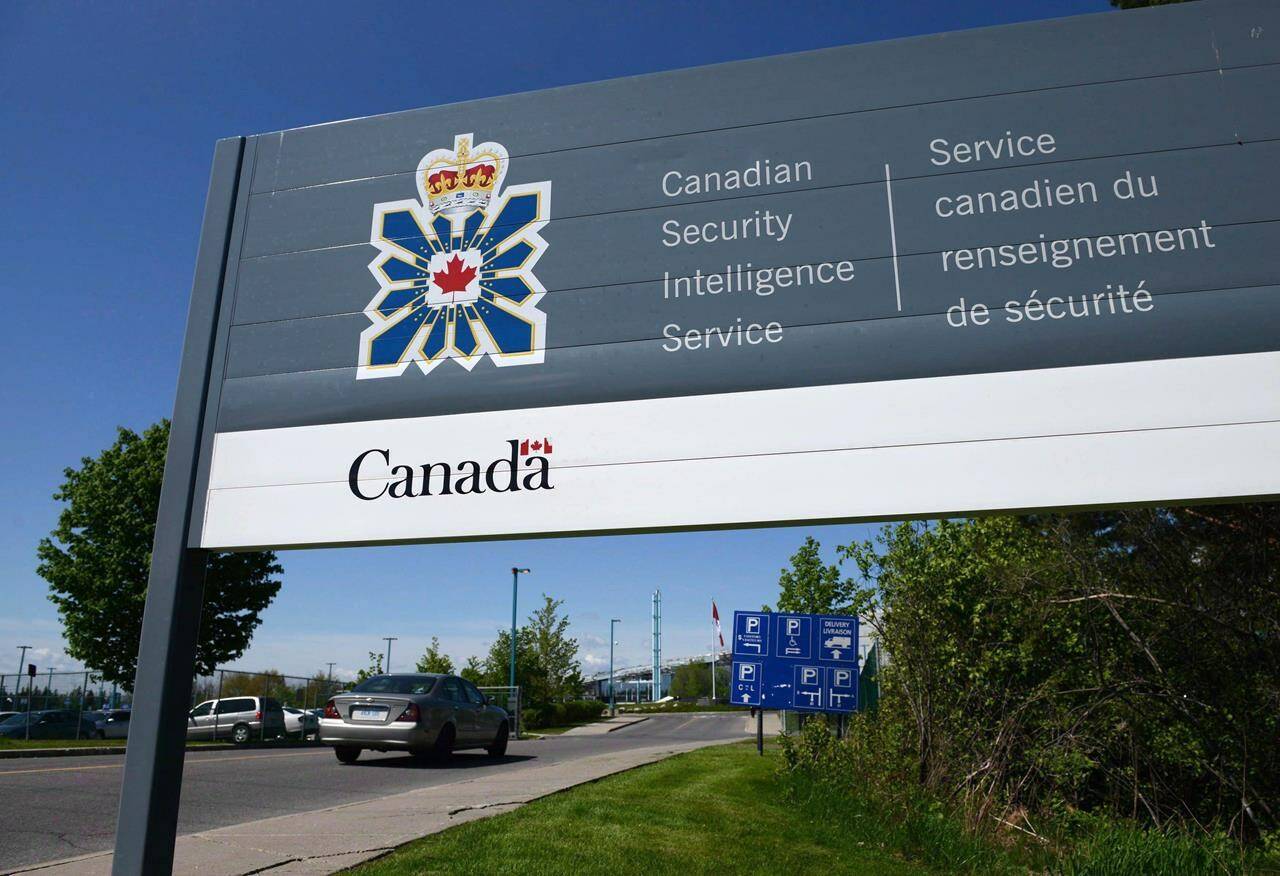 A sign for the Canadian Security Intelligence Service building is shown in Ottawa on May 14, 2013 Sexual harassment scandals that have engulfed Canadian police forces, the military, and now Canada’s spy agency point to long-standing cultures in need of a “deep reckoning” to fix, a law professor says. THE CANADIAN PRESS/Sean Kilpatrick