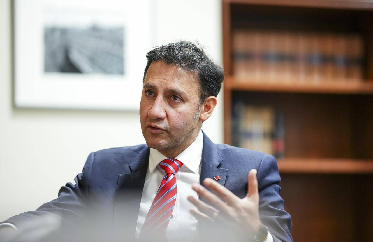 The federal government is considering whether to pause its plan to broaden the rules that govern medically assisted dying to include patients whose only underlying condition is a mental disorder, says Justice Minister Arif Virani. Virani takes part in an interview in Ottawa on Wednesday, Dec. 13, 2023. THE CANADIAN PRESS/Sean Kilpatrick