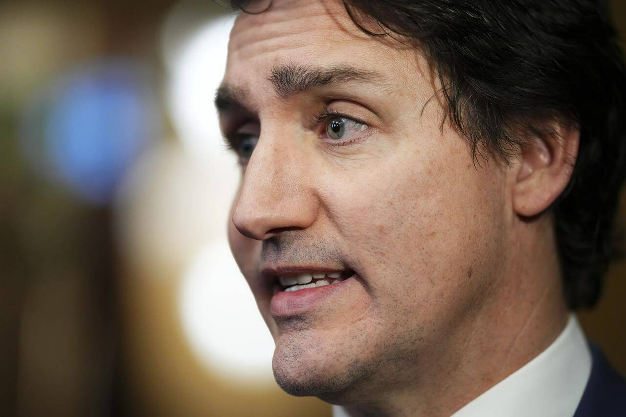 Prime Minister Justin Trudeau speaks to reporters in Ottawa on Dec. 13. THE CANADIAN PRESS/Sean Kilpatrick