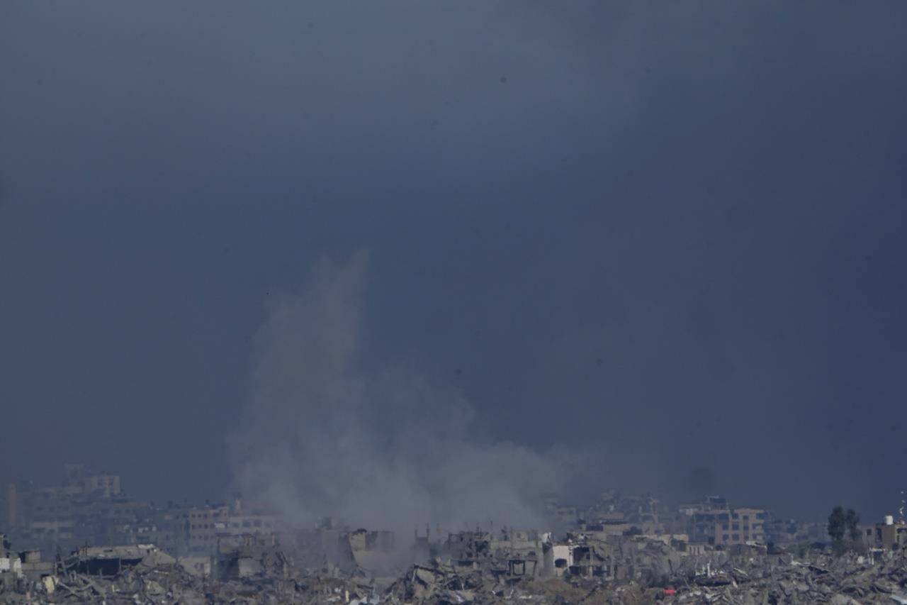 Smoke rises following an Israeli bombardment in the Gaza Strip, as seen from southern Israel , Saturday, Dec. 16, 2023. (AP Photo/Ariel Schalit)