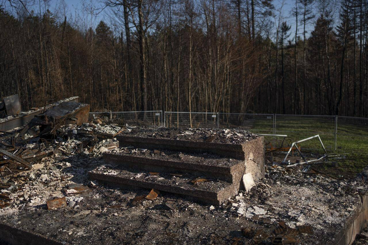 The front step to the McGee family home is pictured amongst the ruins after the home was destroyed in a wildfire earlier this month in the suburban community of Hammonds Plains, N.S. outside of Halifax on Thursday, June 22, 2023. THE CANADIAN PRESS/Darren Calabrese