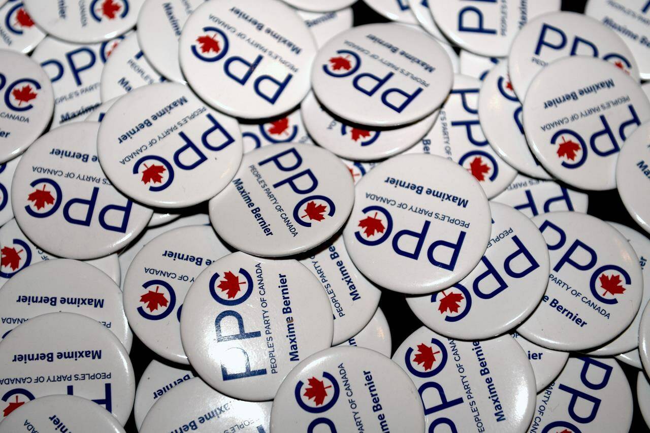 A Vancouver Island People’s Party of Canada candidate who ran against Elizabeth May in the last federal election must stop self-describing as an “engineer,” a B.C. judge ruled earlier this month. People’s Party of Canada buttons are shown at the PPC National Conference in Gatineau, Que., Sunday, Aug. 18, 2019. THE CANADIAN PRESS/Justin Tang