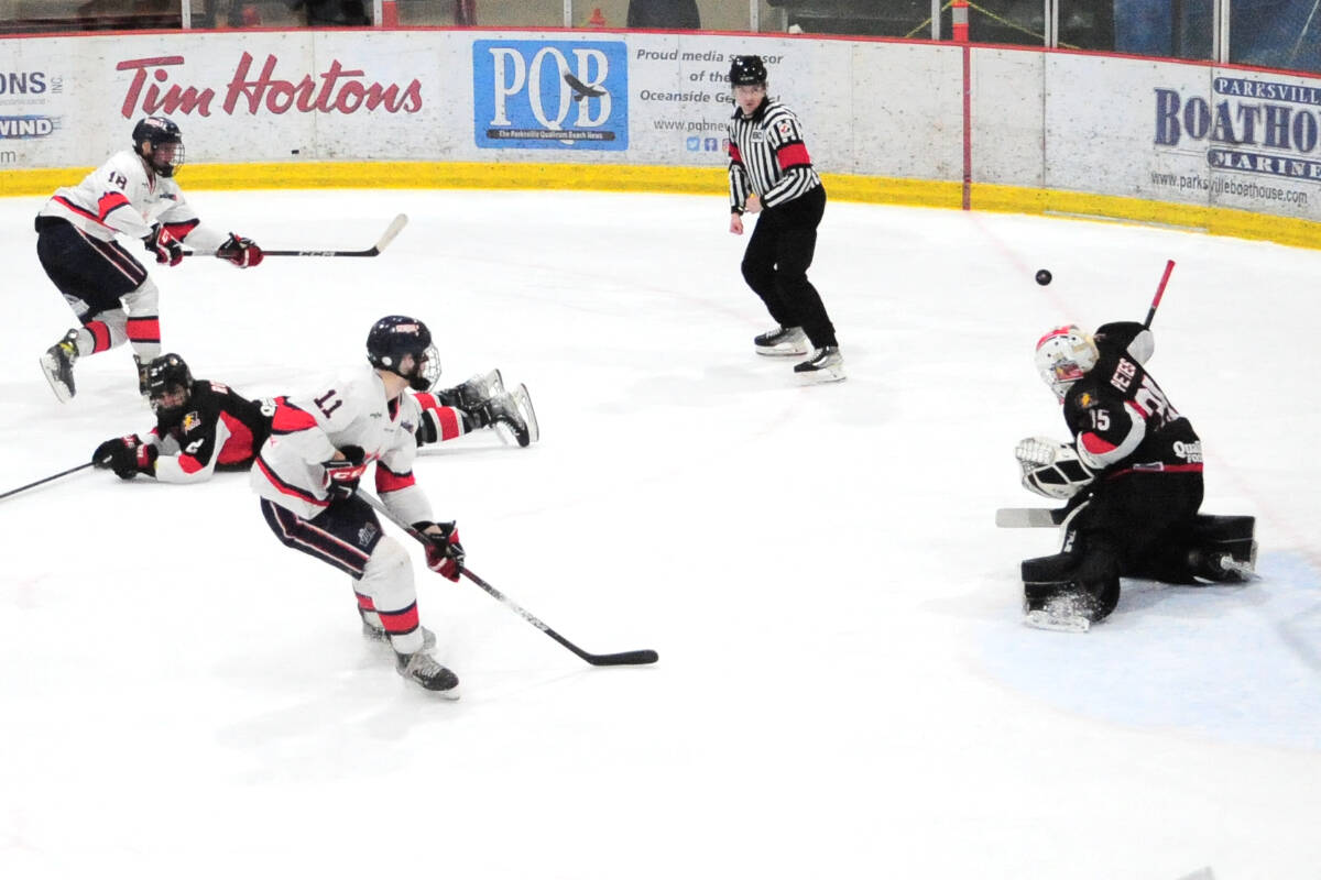 Oceanside Generals Miles Carson fires a shot that was blocked by Campbell River Storm goalie Nick Peters, in a game last season. (Michael Briones photo)
