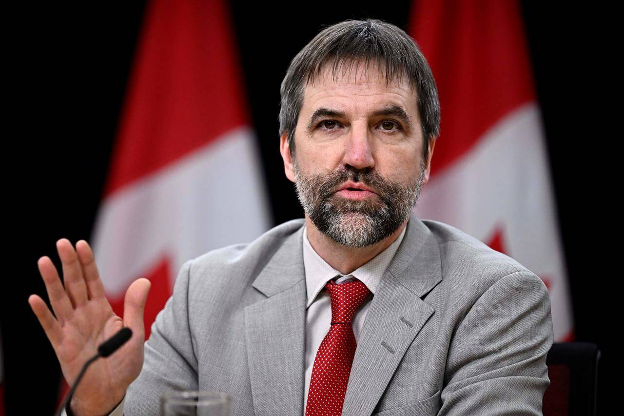 Minister of Environment and Climate Change Steven Guilbeault speaks during a news conference in Ottawa, on Monday, Nov. 20, 2023. Guilbeault will outline today the details of his plan to eventually phase out the sale of gas-powered vehicles in Canada. THE CANADIAN PRESS/Justin Tang