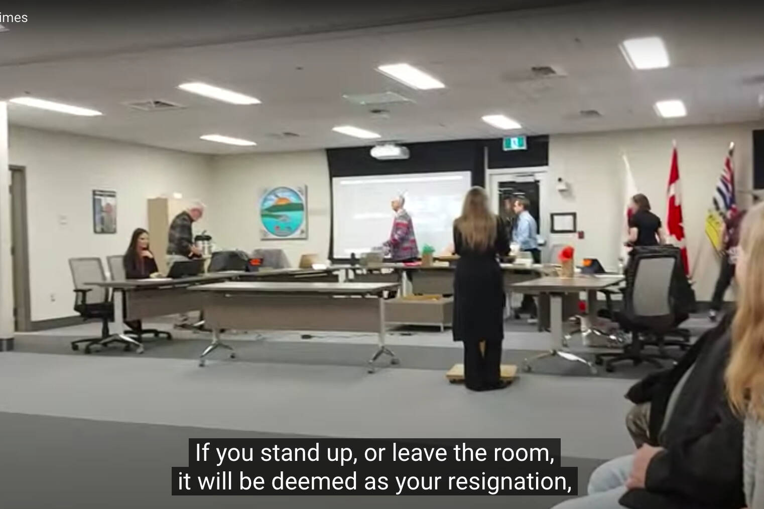 This screen shot of a YouTube video posted by Big Tree View shows Vernon School District staff and board members walking out of a board meeting while a protester sounds off. The video was posted Dec. 15, 2023, two days after the school board’s most recent meeting. (YouTube image)