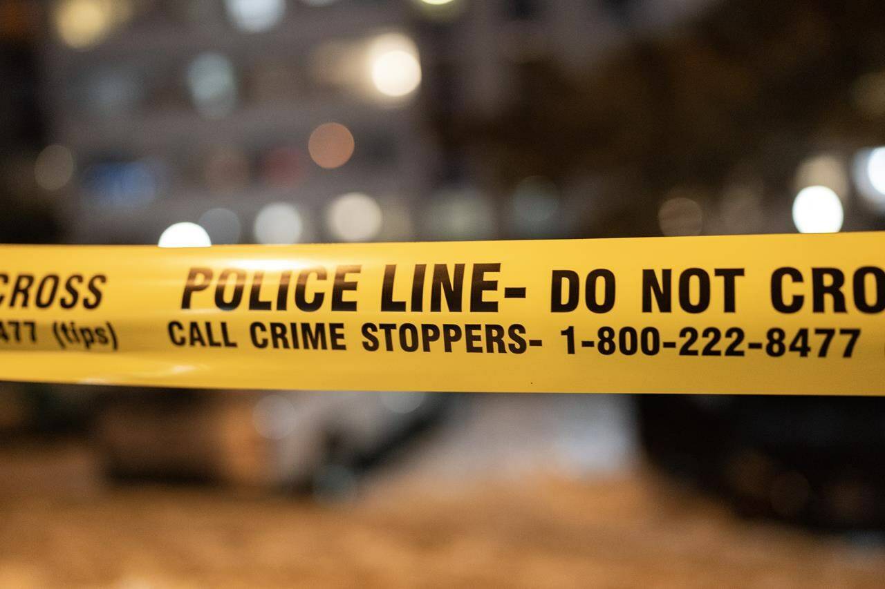 A tally compiled by The Canadian Press found police shot at 85 people in Canada between Jan. 1 and Dec. 15 — 41 fatally. Police tape is shown at the scene of a shooting in Toronto on Saturday, Jan. 14, 2023. THE CANADIAN PRESS/Arlyn McAdorey