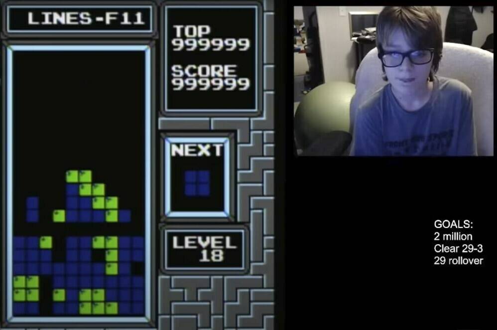 In this image taken from video, 13-year-old player named Willis Gibson plays a game of Tetris. Gibson, who in late December became the first player to officially “beat” the original Nintendo version of the game. By breaking it, of course. Technically, Gibson — aka “blue scuti” in the gaming world — made it to what gamers call a “kill screen,” a point where the Tetris code glitches, crashing the game. (Willis Gibson via AP)