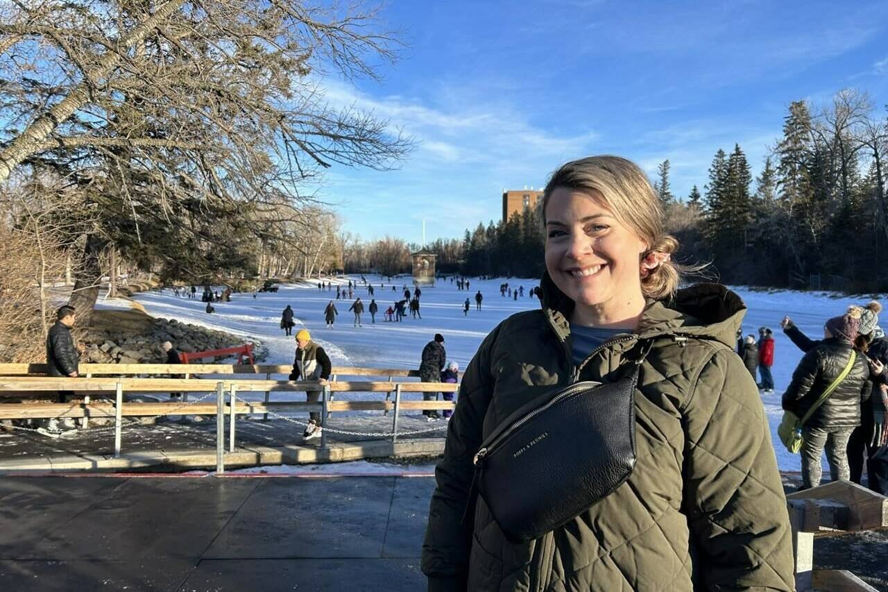 Krystle Wilpert stands in front of the outdoor skating rink on the lagoon at Bowness Park in Calgary on Tuesday, Jan. 2, 2024. THE CANADIAN PRESS/Colette Derworiz