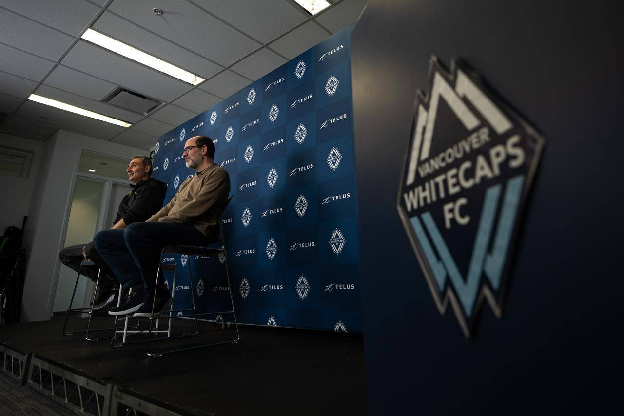 Two months after his team were eliminated from Major League Soccer playoffs, Vancouver Whitecaps head coach Vanni Sartini is looking forward rather than back ahead of the new season. Sartini, left, and Whitecaps CEO & Sporting Director, Axel Schuster, speak during an end-of-season news conference in Vancouver, B.C., Tuesday, Nov. 7, 2023. THE CANADIAN PRESS/Ethan Cairns