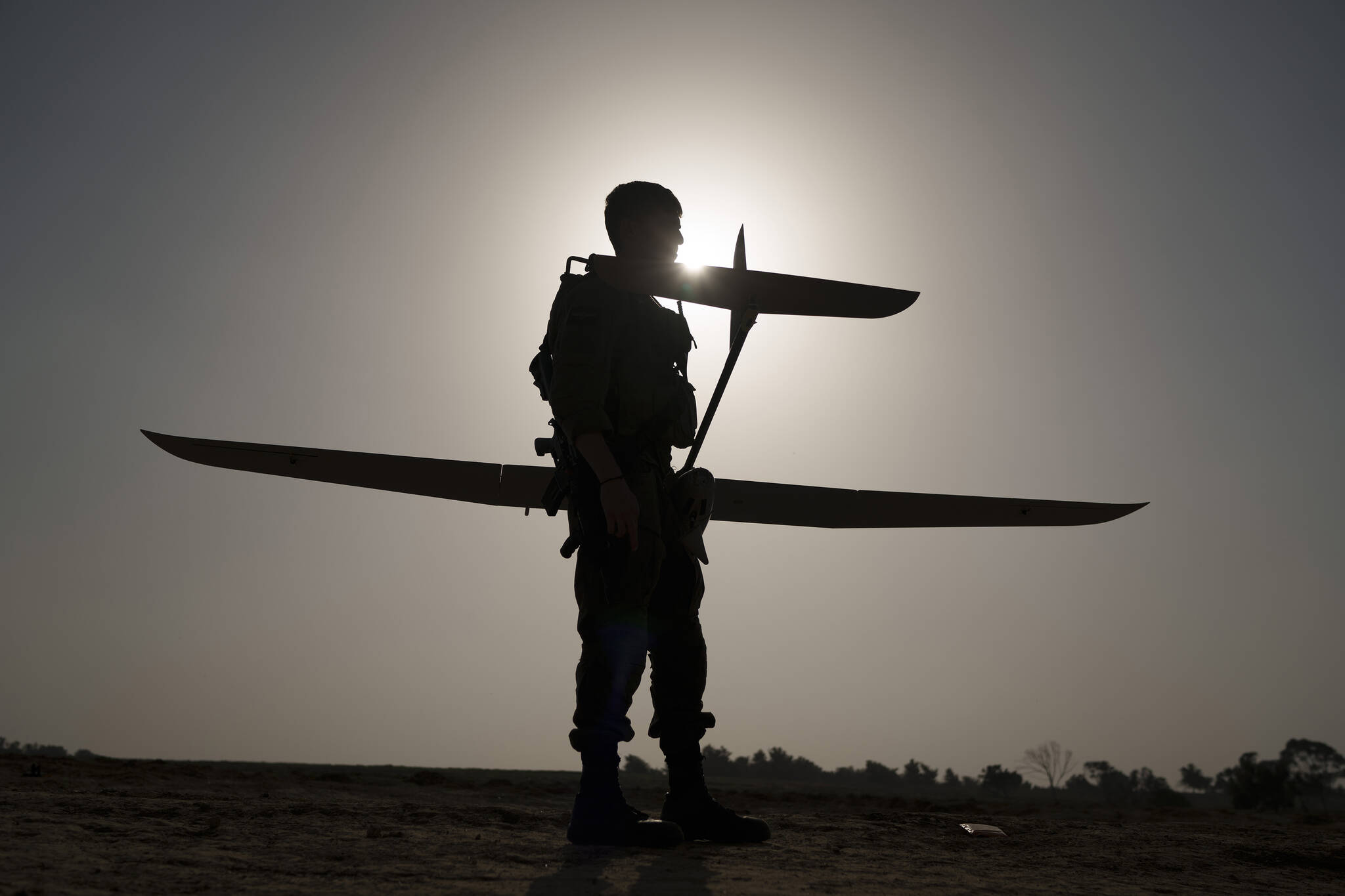 An Israeli soldier prepares a drone to be launched near the Israeli-Gaza border, southern Israel, Tuesday, Jan. 9, 2024. (AP Photo/Leo Correa)