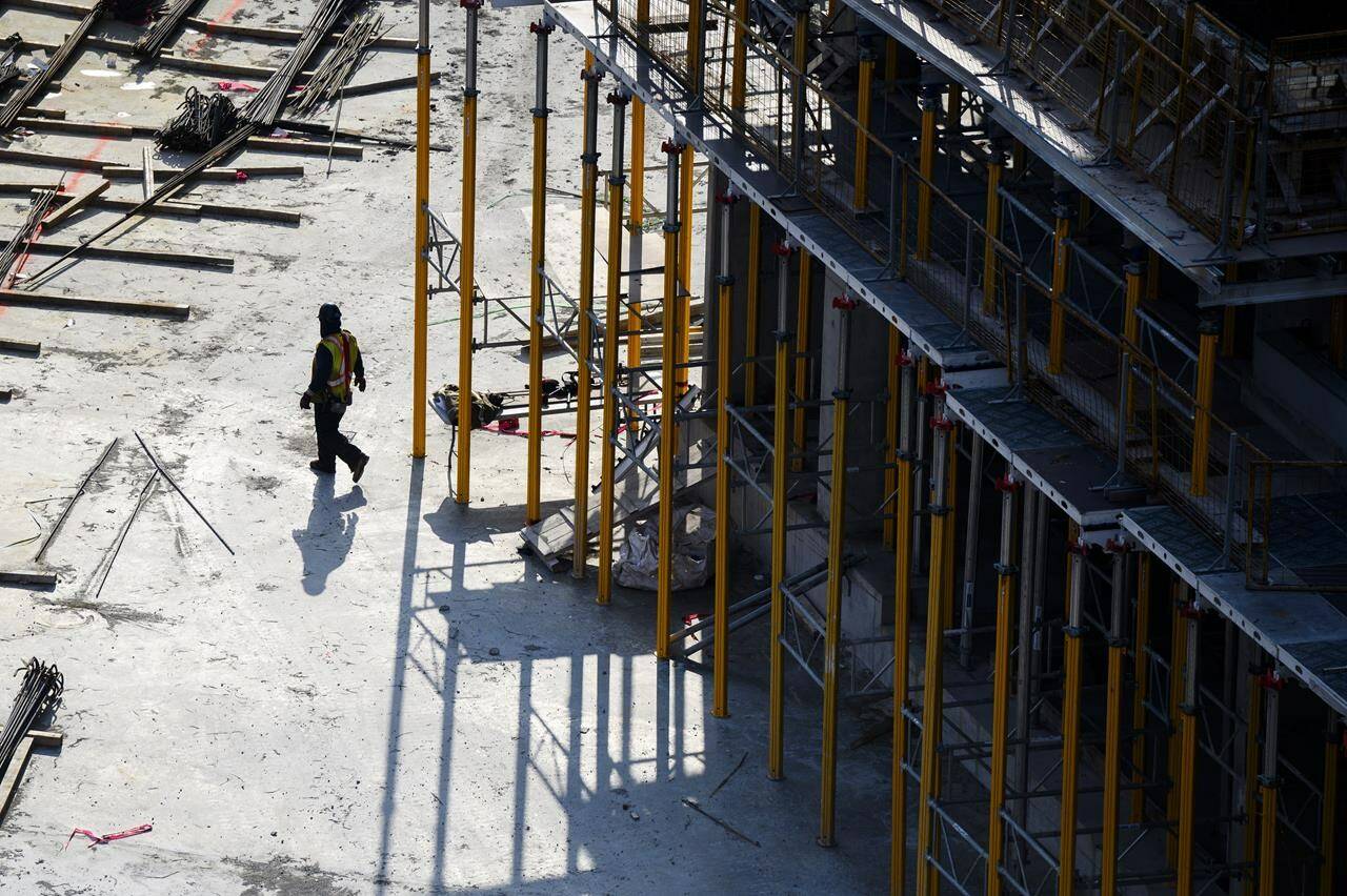 Federal public servants warned the government two years ago that large increases to immigration could affect housing affordability and services, internal documents show. A construction worker is shown at a building site in Ajax, Ont., on Thursday, Nov., 30, 2023. THE CANADIAN PRESS/Christopher Katsarov