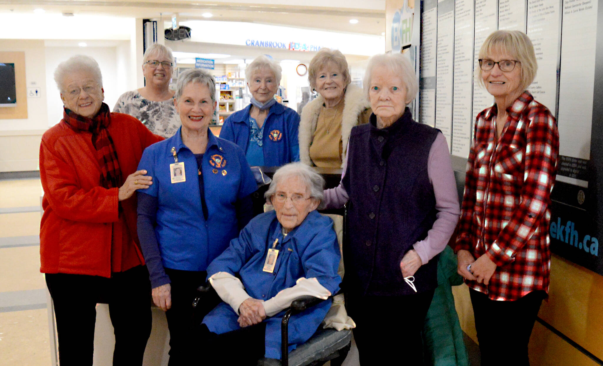 At right: Edith Rose (front, centre) was joined at the East Kootenay Regional Hospital by members of the Cranbrook Health Care Auxiliary. Left to right: Evelyn Botterill, Janice Gauthier, Dianne Camilli, Kate Fox, Odette Rouse, Diane Greaves, Linda Foster. (Barry Coulter photo)
