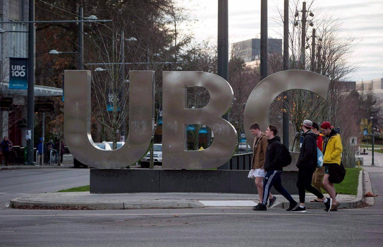 Novelist and former University of British Columbia professor Steven Galloway has won a years-long battle to have his defamation lawsuit proceed against a woman who says her raped her, which Galloway denies. People walk past large letters spelling out UBC at the University of British Columbia in Vancouver on Nov. 22, 2015. THE CANADIAN PRESS/Darryl Dyck