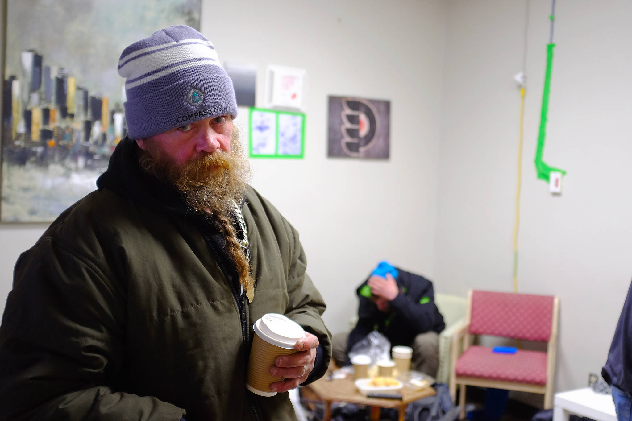 9:07 p.m. - Jack enjoys a warm cup of coffee at the Connect Centre before venturing outside for the night due to limited shelter space. (Olivier Laurin / Comox Valley Record)