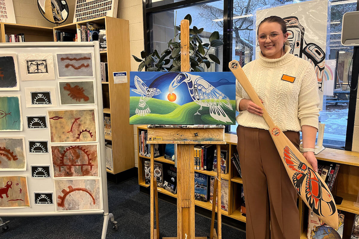 Faith Johnson-Jourdain, a Grade 12 student at Mount Boucherie with her art from the school’s Indigenous Art class. (Jacqueline Gelineau/Capital News)