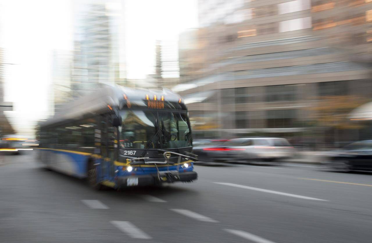 A potential strike by more than 180 transit supervisors seeking a new contract in British Columbia’s Lower Mainland could have a major effect on commuters next week, with the bus drivers’ union saying it would back such action. A bus is pictured in downtown Vancouver, Friday, November, 1, 2019. THE CANADIAN PRESS/Jonathan Hayward