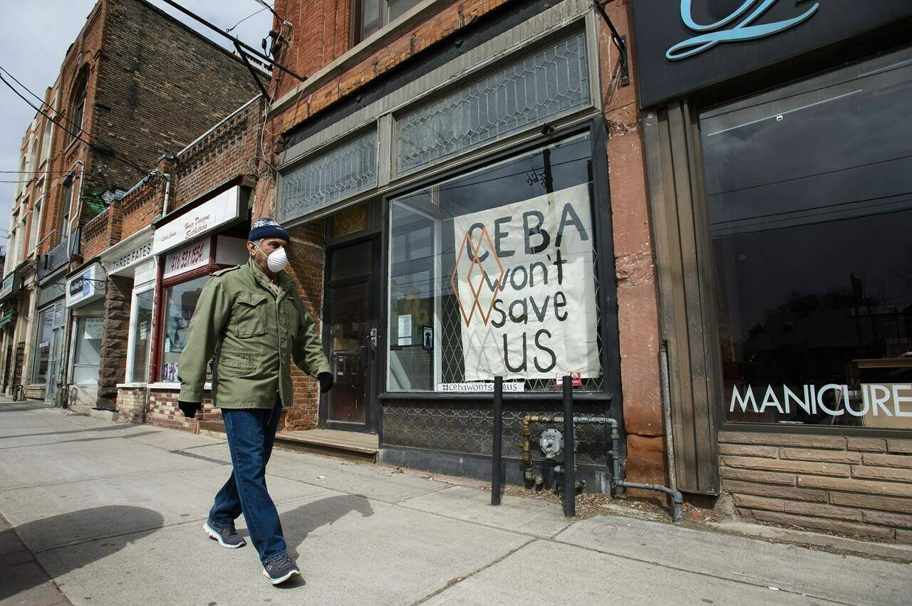 The deadline for Canadian businesses to repay pandemic loans and receive partial forgiveness has arrived, as business groups say it could mean closure for many firms. A closed store front boutique business called Francis Watson pleads for help displaying a sign in Toronto on Thursday, April 16, 2020. THE CANADIAN PRESS/Nathan Denette