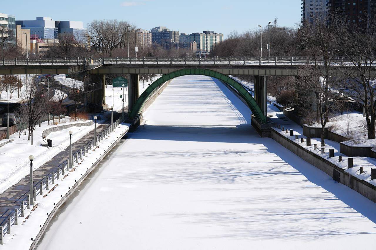 An unopened Rideau Canal is pictured in Ottawa on Friday, Feb. 24, 2023. Ottawa is looking at another weekend without skating on the Rideau Canal, even with below-normal winter temperatures on the horizon for the weekend. THE CANADIAN PRESS/Sean Kilpatrick