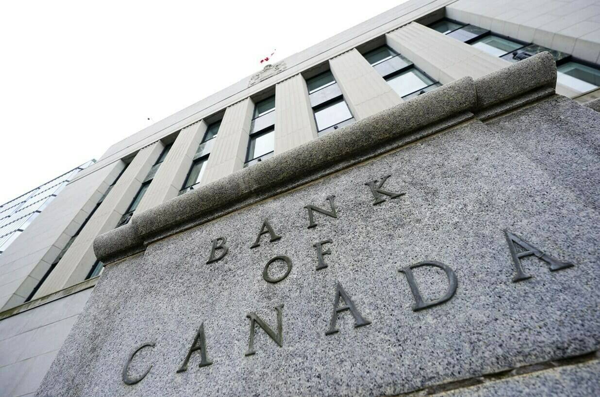 As the Bank of Canada gears up to announce its next interest rate decision Wednesday, economists will on the lookout for any clues on when it plans to start cutting interest rates. The Bank of Canada is shown in Ottawa on Tuesday, July 12, 2022. THE CANADIAN PRESS/Sean Kilpatrick