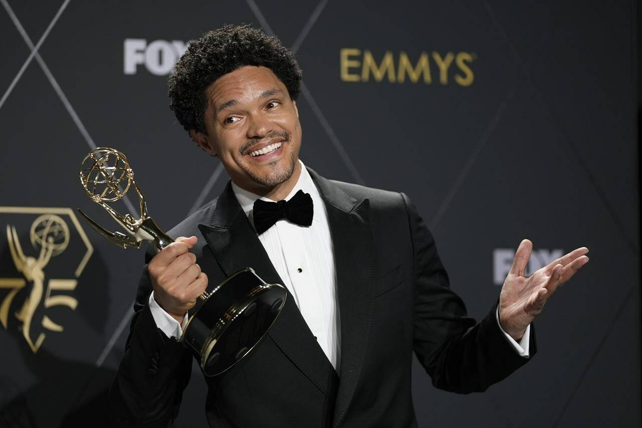 Trevor Noah, winner of the award for outstanding variety talk series for “The Daily Show With Trevor Noah,” poses in the press room during the 75th Primetime Emmy Awards on Monday, Jan. 15, 2024, at the Peacock Theater in Los Angeles. (AP Photo/Ashley Landis)