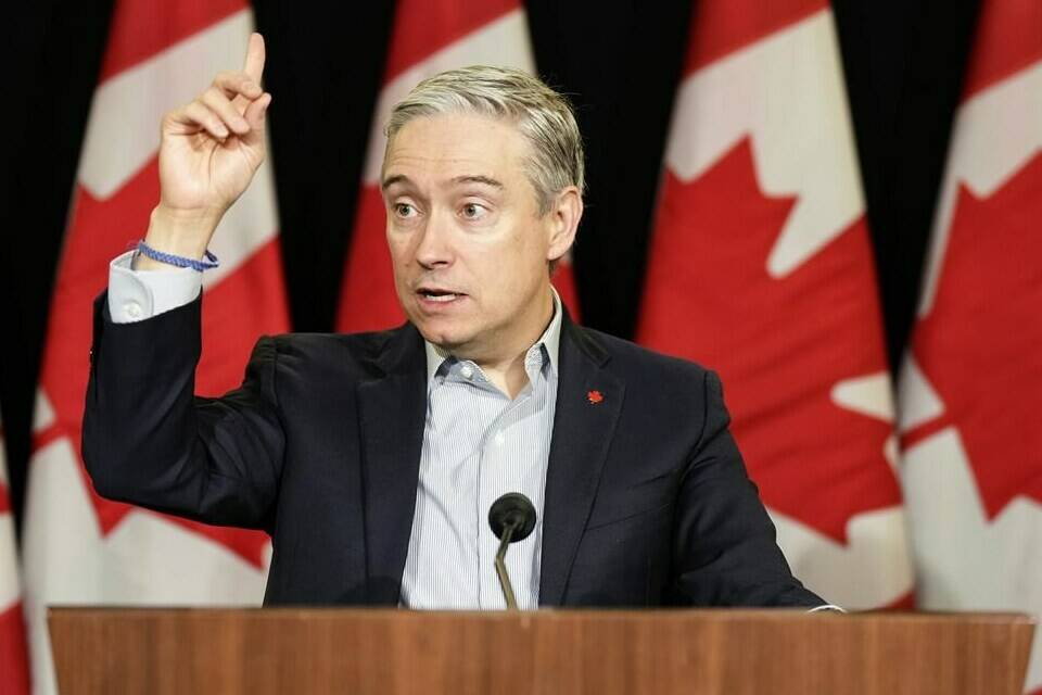 Minister of Innovation, Science and Industry Francois-Philippe Champagne speaks to the media during the federal cabinet retreat in Montreal, Monday, Jan. 22, 2024. THE CANADIAN PRESS/Christinne Muschi