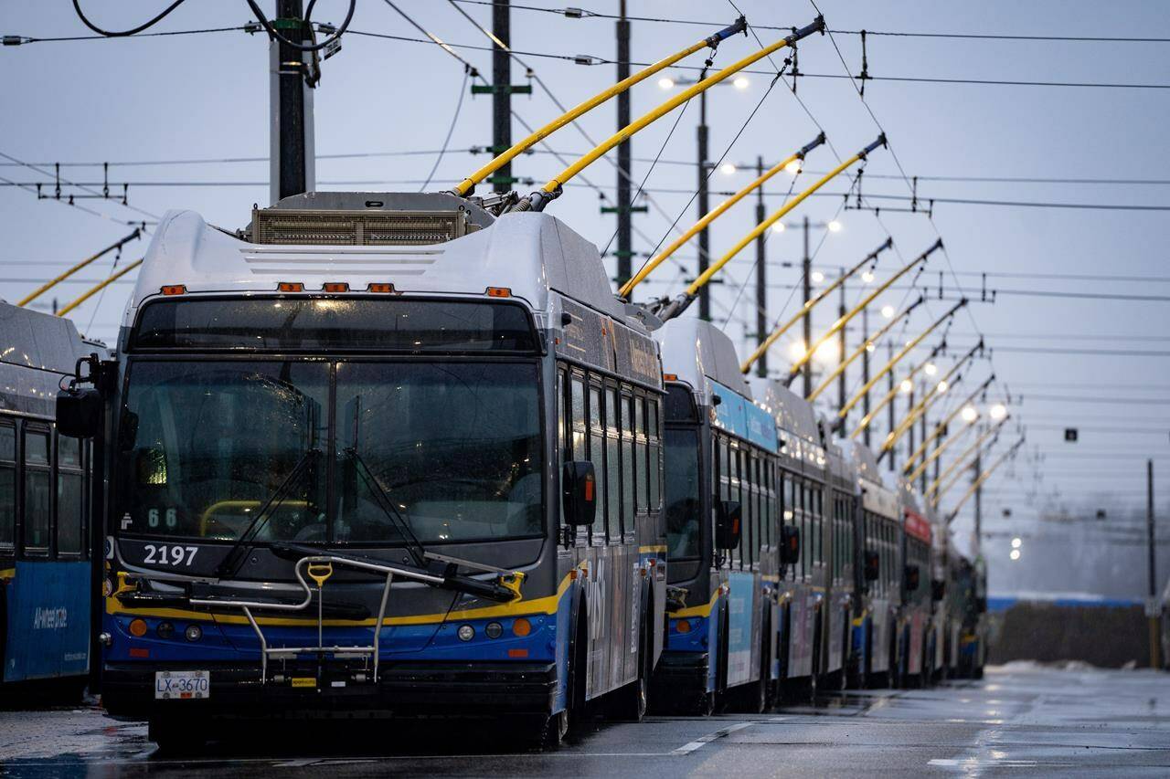 Buses line the Vancouver Transit Centre as transit workers from the Canadian Union of Public Employees Local 4500 strike in Vancouver, B.C., Monday, Jan. 22, 2024. Bus and SeaBus services in Metro Vancouver are set to resume this morning after the end of a 48-hour strike by supervisors that ground Coast Mountain Bus Company routes to a standstill. THE CANADIAN PRESS/Ethan Cairns