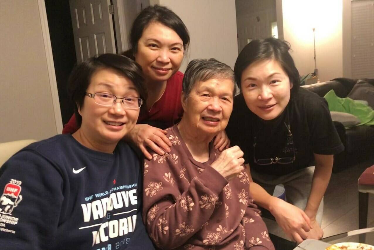 Brenda Wong says she and her sisters have learned to navigate “the long journey” of dementia, which requires supports tailored for various racialized groups. Wong, top wearing red blouse, is seen in an undated handout photo with her sisters Wendy, left, and Bonnie, with their mother. THE CANADIAN PRESS/HO-Brenda Wong