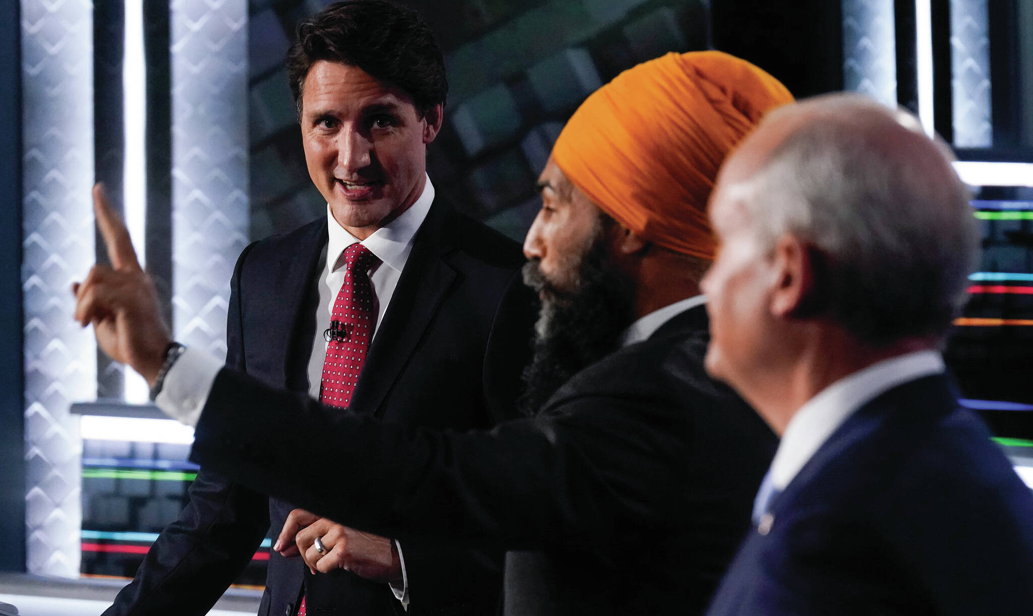 Liberal Leader Justin Trudeau, left to right, NDP Leader Jagmeet Singh, and Conservative Leader Erin O’Toole take part in the federal election English-language Leaders debate in Gatineau, Que., on Thursday, Sept. 9, 2021. Do you know which party received the greatest share of the popular vote in that election? THE CANADIAN PRESS/Adrian Wyld
