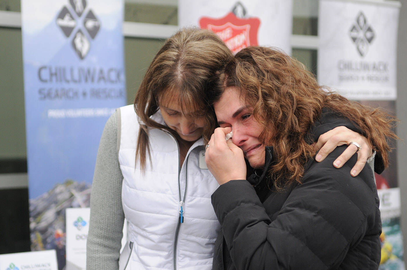 Corinna Ivey (left), manager at Sardis Safeway, comforts Eva Pucci Couture during a media interview outside the grocery store on Friday, Jan. 26, 2024. That day marked the fifth anniversary of the disappearance of her son, Kristofer Couture. (Jenna Hauck/ Chilliwack Progress)