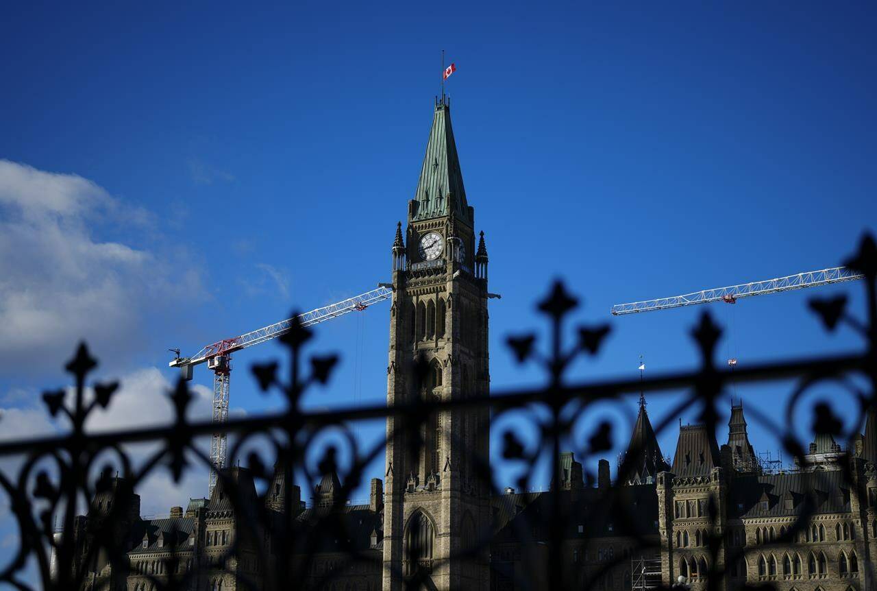 The federal government posted a deficit of $19.1 billion for the first eight months of its 2023-24 fiscal year. The Peace Tower of Parliament Hill is shown in Ottawa, Wednesday, Dec. 13, 2023. THE CANADIAN PRESS/Sean Kilpatrick