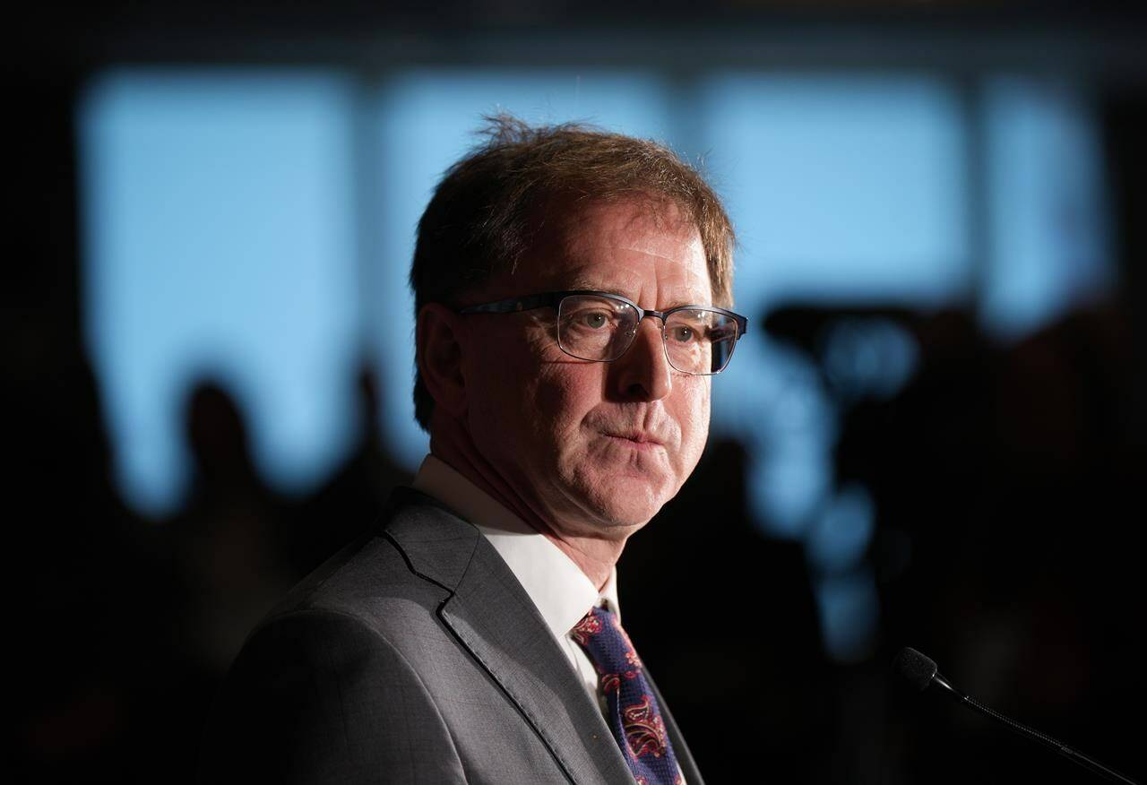 B.C. Health Minister Adrian Dix pauses while responding to questions during a news conference in Vancouver, on Monday, November 7, 2022. British Columbia’s health minister has weighed in on hockey violence, saying the Criminal Code applies both on and off the ice, after an incident in which a player appeared to put a goalie in a chokehold.THE CANADIAN PRESS/Darryl Dyck