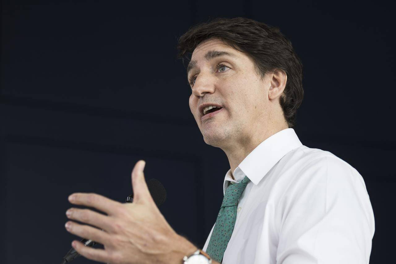 Prime Minister Justin Trudeau is calling Alberta’s new proposals on the treatment of transgender youth the “most anti-LGBT of anywhere in the country.” Trudeau makes an announcement in Waterloo, Ont. on Friday, Feb. 2, 2024. THE CANADIAN PRESS/Nick Iwanyshyn