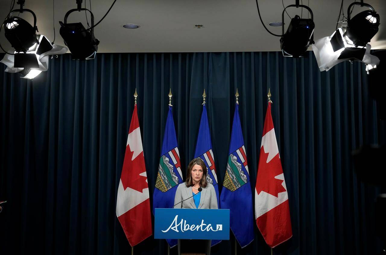 Alberta Premier Danielle Smith answers questions at a news conference in Calgary on Thursday, February 1, 2024. Doctors are criticizing Alberta Premier Danielle Smith for her medically “false” statements about transgender youth care and gender reassignment surgery. THE CANADIAN PRESS/Todd Korol