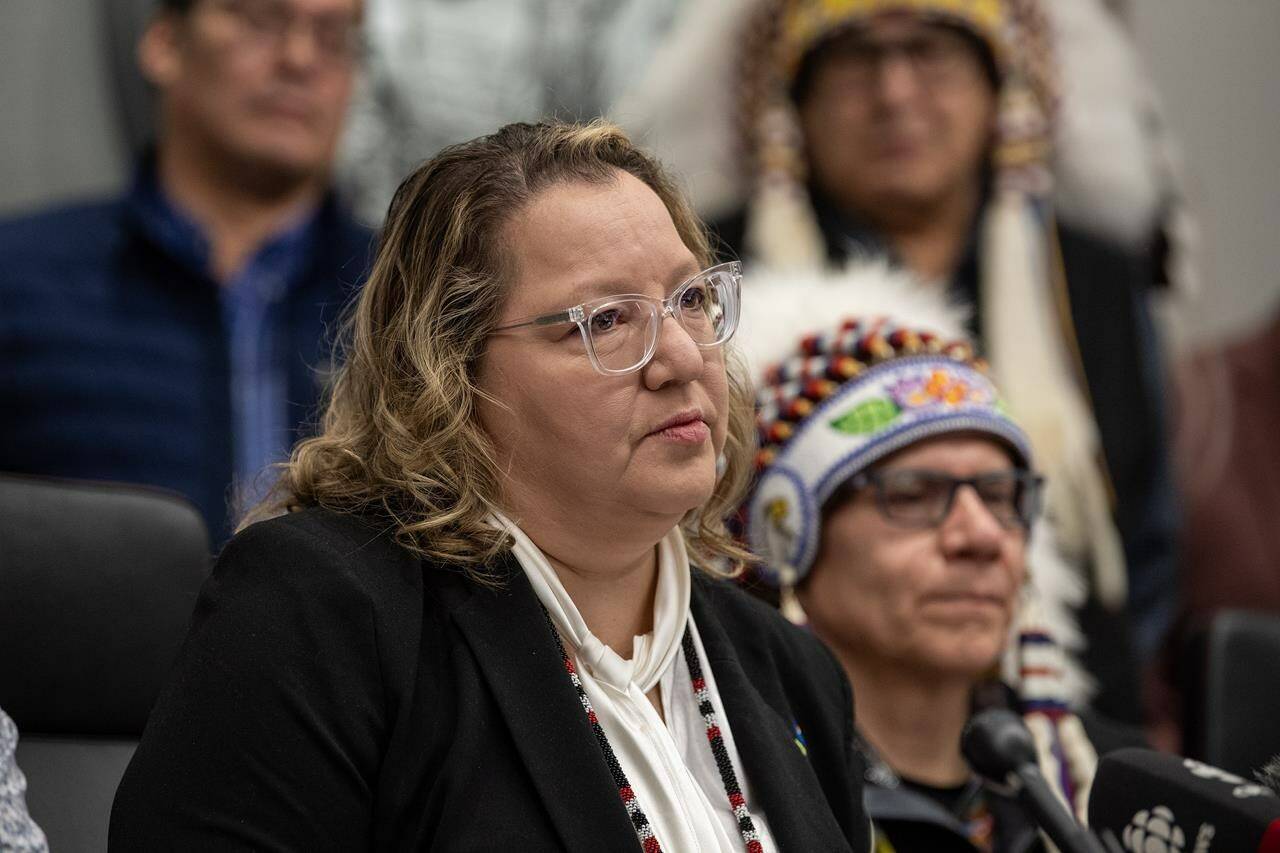 National Chief of the Assembly of First Nations (AFN) Cindy Woodhouse during a media event hosted by the Federation of Sovereign Indigenous Nations (FSIN) to address concerns regarding the local coroner’s inquest in the mass stabbing event on James Smith Cree Nation in 2022, in Saskatoon, Thursday, Feb. 1, 2024. THE CANADIAN PRESS/Liam Richards