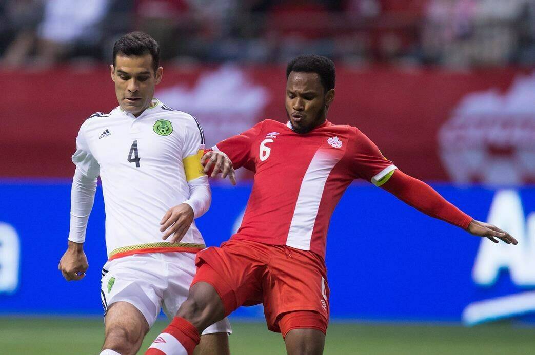 <div>The New York Red Bulls have named former Canada captain Julian de Guzman as their new sporting director. Mexico's Rafael Marquez, left, passes the ball past de Guzman during first half FIFA World Cup qualifying soccer action in Vancouver, B.C., Friday March 25, 2016. THE CANADIAN PRESS/Darryl Dyck</div>