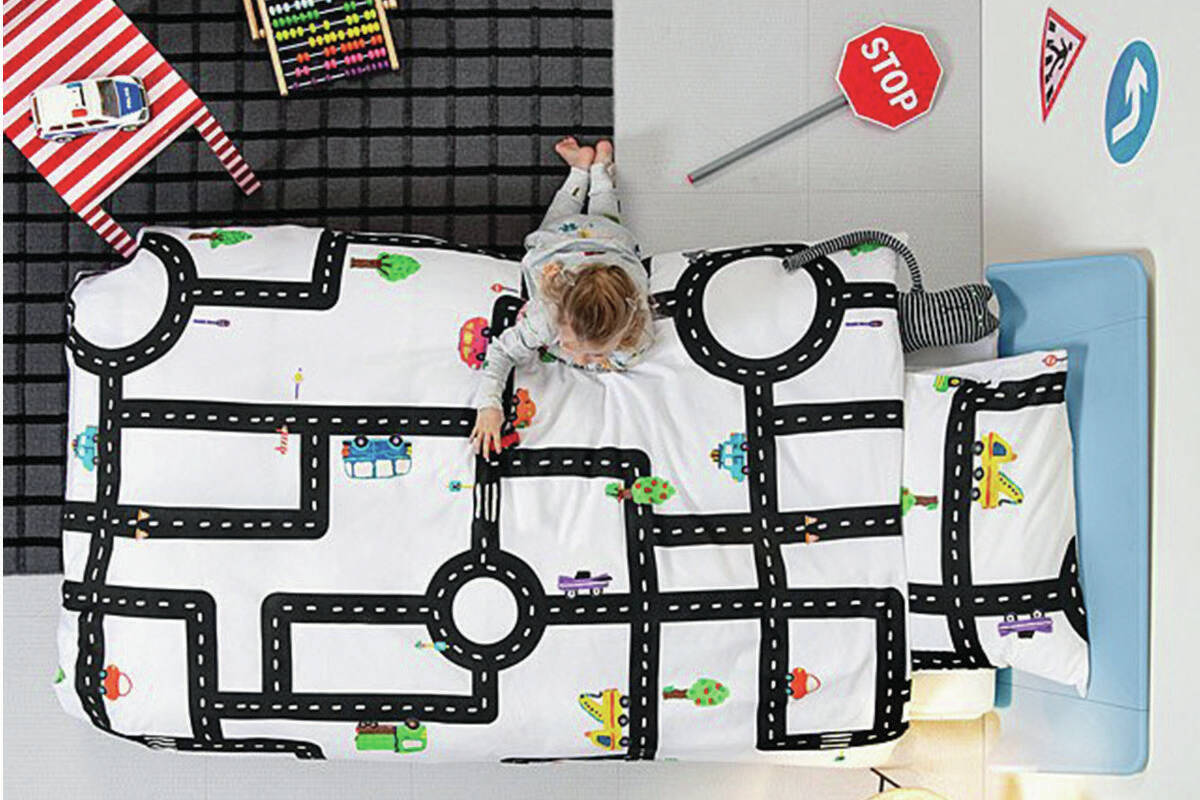 The Road Map Duvet and Pillowcase Set features a maze of roads, roundabouts and vehicle illustrations to fill their imaginations.