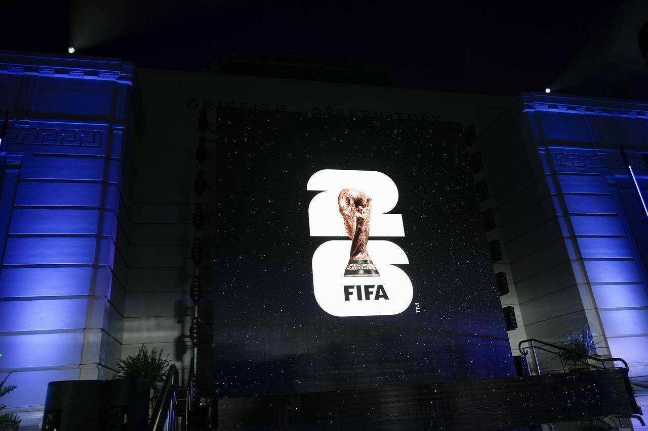 FIFA lifts the cover, at least partially, on the 2026 FIFA World Cup schedule via a televised reveal from CONCACAF headquarters in Miami. The logo for the 2026 World Cup is shown on a screen outside Griffith Observatory in Los Angeles on Wednesday, May 17, 2023. THE CANADIAN PRESS/AP-Jae C. Hong