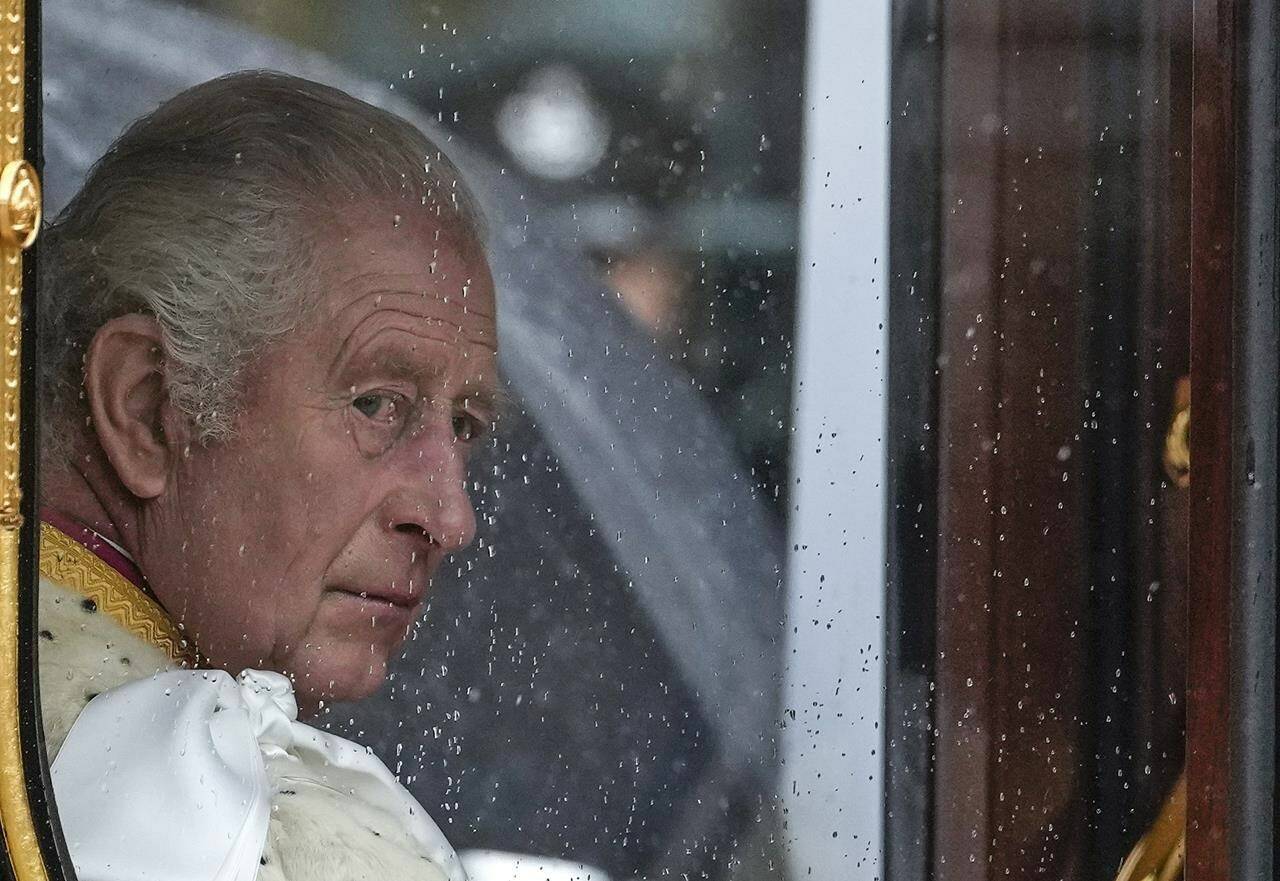 FILE - Britain’s King Charles III makes his way to Westminster Abbey prior to his coronation ceremony in London Saturday, May 6, 2023. King Charles III has been diagnosed with a form of cancer and has begun treatment, Buckingham Palace says on Monday, Feb. 5, 2024. (AP Photo/Alessandra Tarantino, File)
