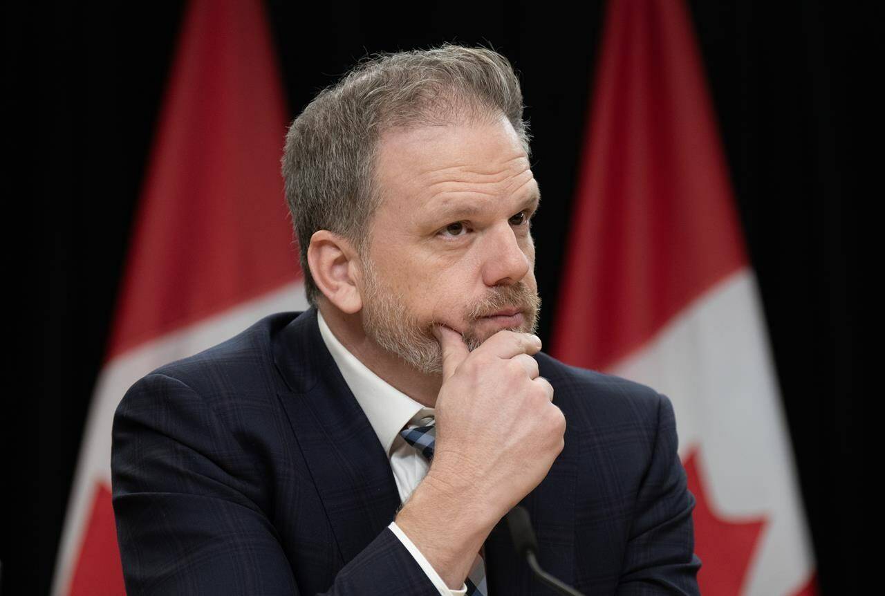 Minister of Health Mark Holland listens to a question from a reporter during a news conference, Tuesday, Dec. 12, 2023, in Ottawa. THE CANADIAN PRESS/Adrian Wyld