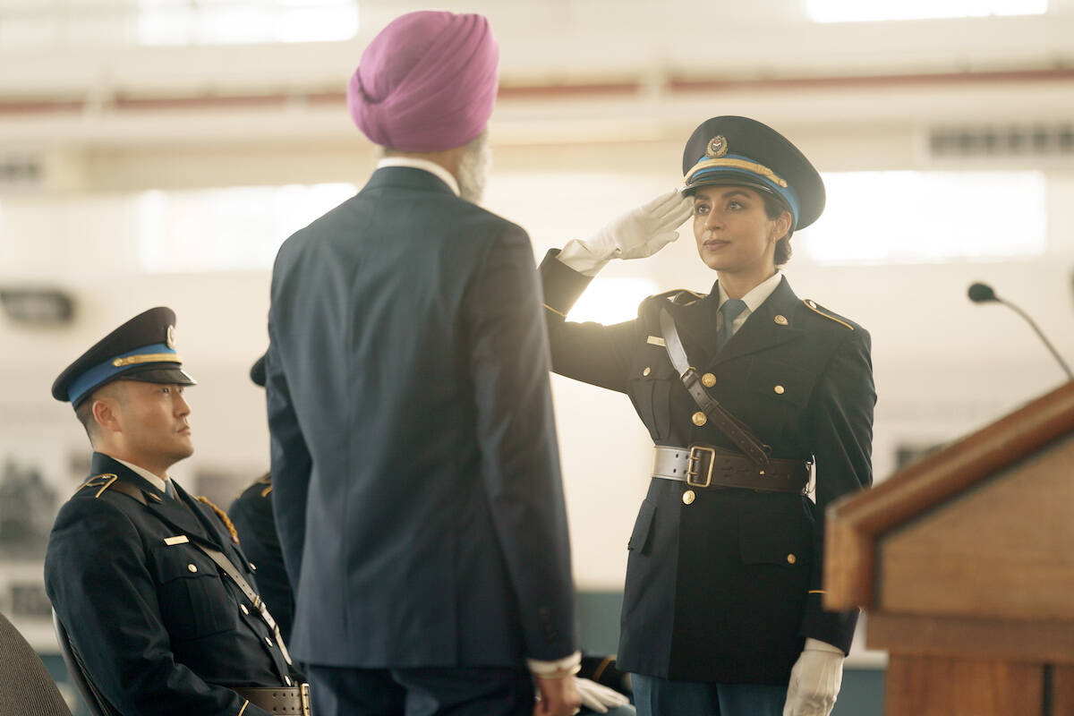 Supinder Wraich (as the character Sabrina Sohal) salutes in a scene in CBC’s new Surrey-set police drama, “Allegiance,” to debut Wednesday, Feb. 7, 2024. (Photo: Darko Sikman via CBC/Lark Productions)