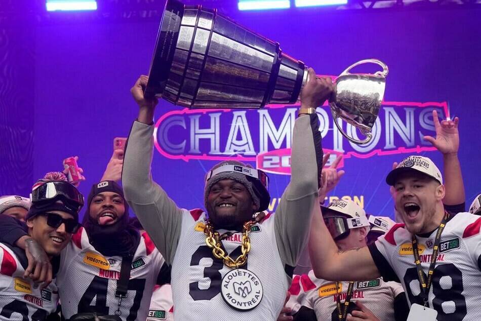 Montreal Alouettes running back William Stanback holds up the Grey Cup during the Grey Cup celebration in Montreal on Wednesday, Nov. 22, 2023. The 29-year-old American had spent the last five seasons with the Alouettes before being released last week. THE CANADIAN PRESS/Ryan Remiorz